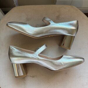 Silver mary jane pumps